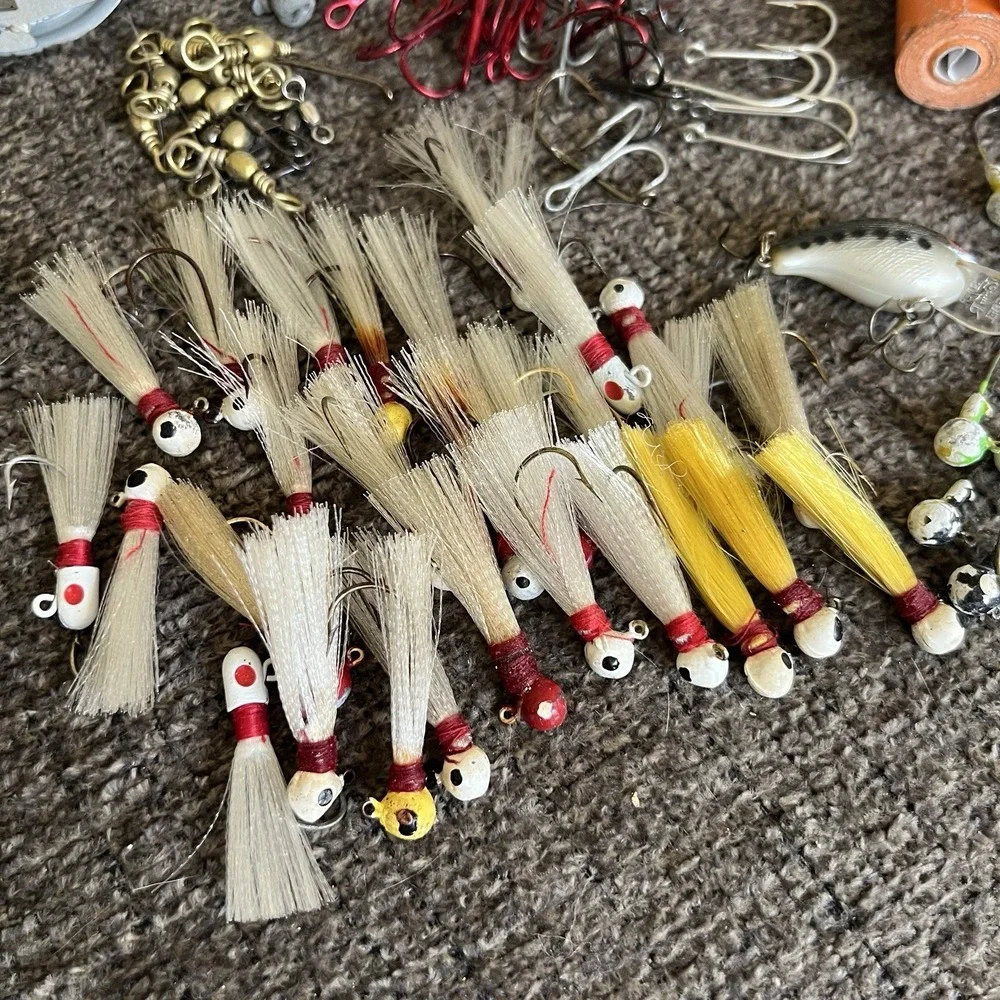 Plano Tackle Box Lot with Rebel Lure Bucktail Jigs Hooks Swivels and Hand Reel
